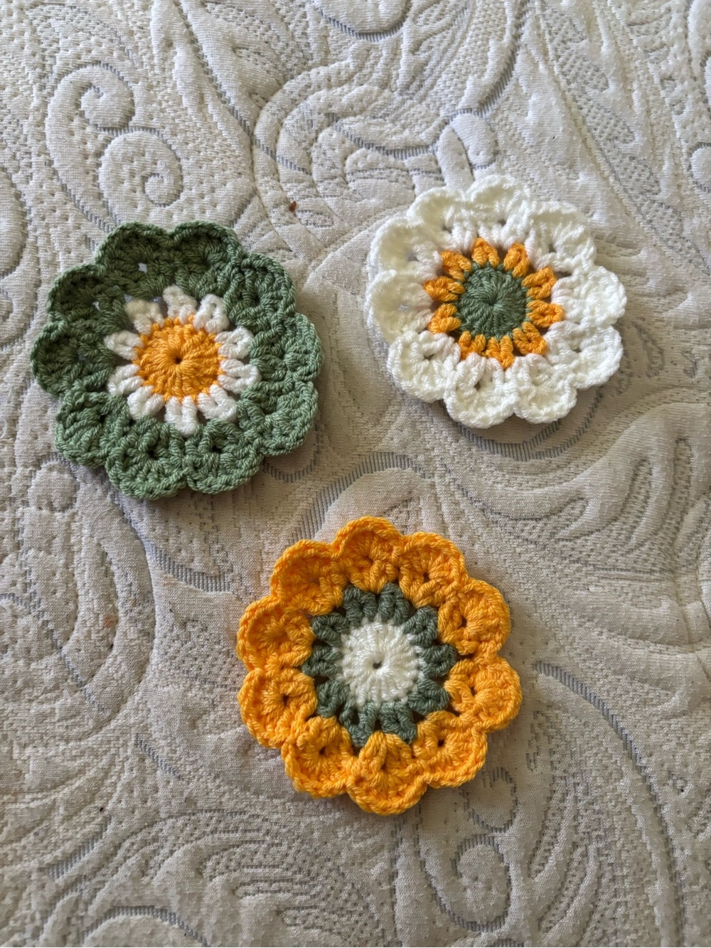 Handmade Crochet Flower Coasters in Green, White, and Yellow